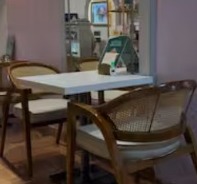 Table by the arched mirror