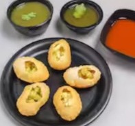 Pani puri with tangy waters